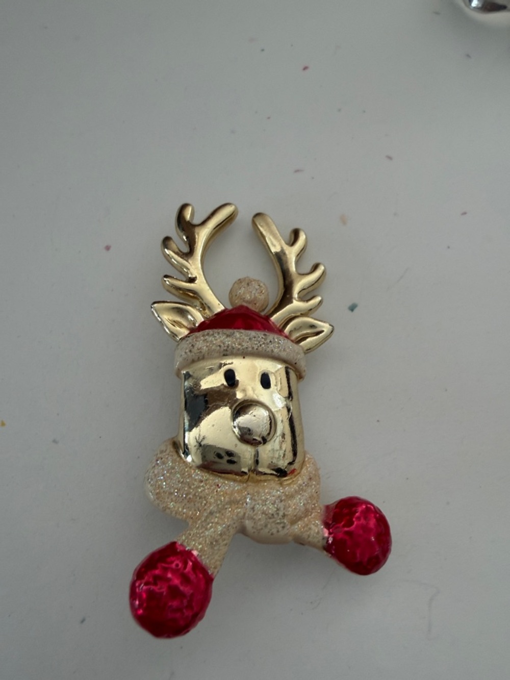 Gold Reindeer Pin with Red Accents